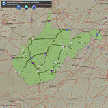 Image of the outline of West Virginia in Green showing the major road networks in blue